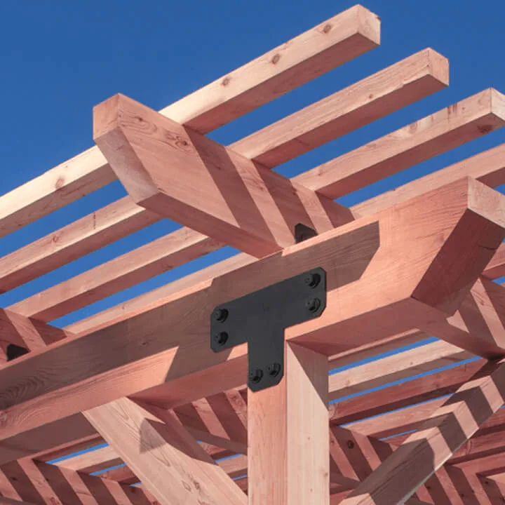 Close-up of Simpson Strong-Tie Outdoor Accents decorative connector and fasteners on wood framing